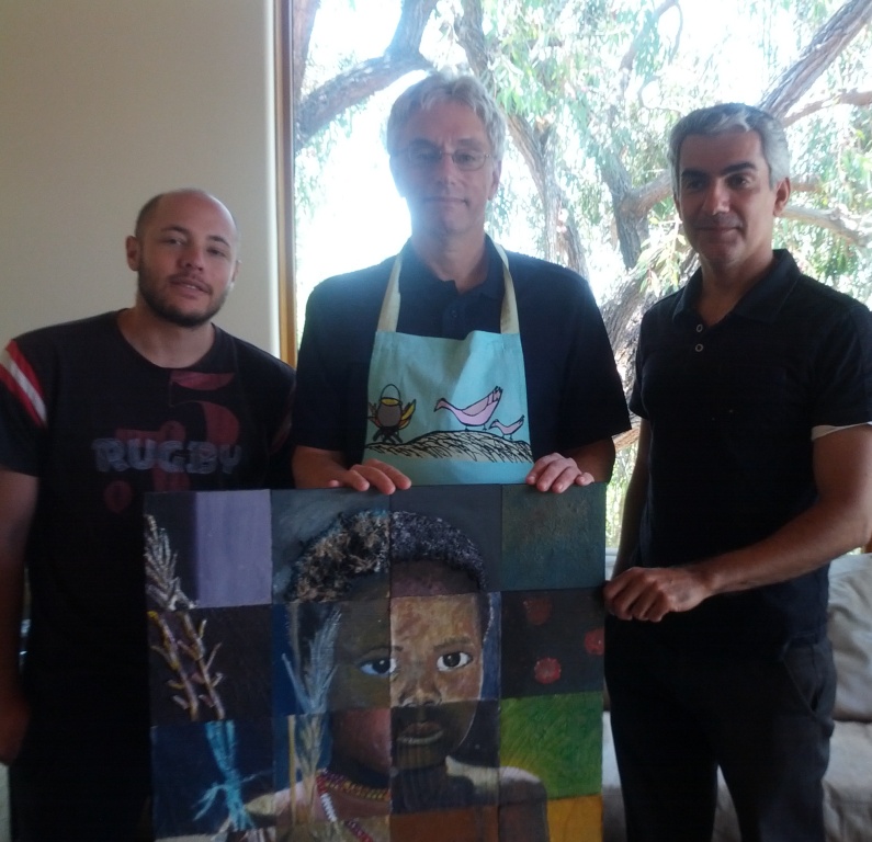 CHOSA board members and donors pose with South African artwork